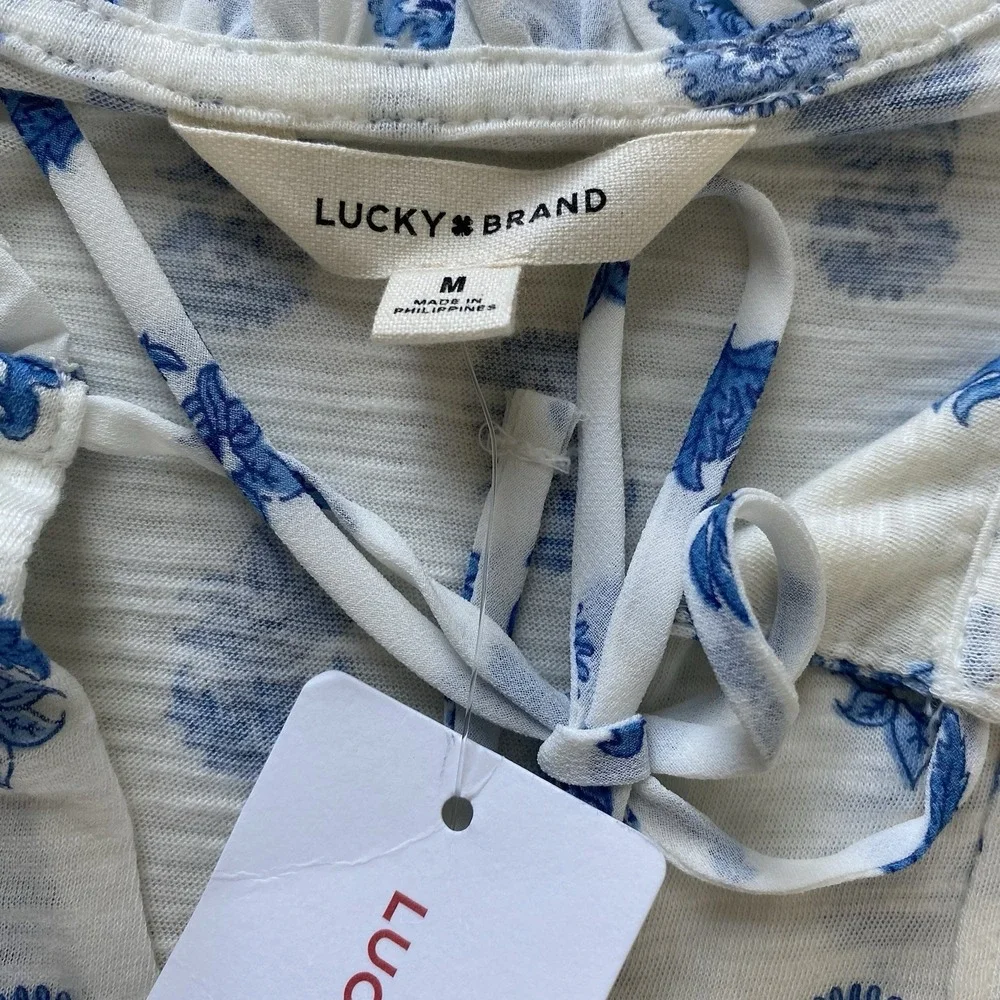 Lucky Brand Sz M Blue White Floral Print Ruffle Split Tie Neck Top Lightweight - Picture 11 of 15